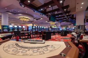 a casino with a poker machine on a table at River Cree Resort & Casino in Edmonton