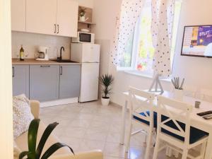 Küche/Küchenzeile in der Unterkunft Holiday Home Casa Bianca