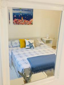 Ein Bett oder Betten in einem Zimmer der Unterkunft Holiday Home Casa Bianca