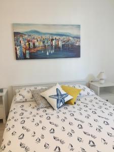 Ein Bett oder Betten in einem Zimmer der Unterkunft Holiday Home Casa Bianca
