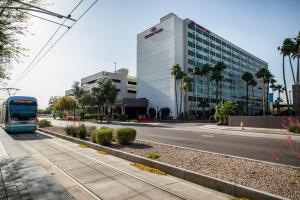 a city street with a large building at Crowne Plaza Phoenix Airport, an IHG Hotel in Phoenix