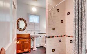 a bathroom with a sink and a mirror at West Tisbury Inn in West Tisbury +20 photos