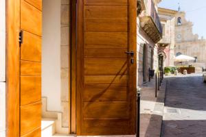 Fotografie z fotogalerie ubytování Il Galletto Viola, luxury room & suite v destinaci Palazzolo Acreide