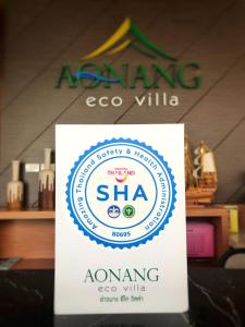 a sign for an agaveoco villella on a table at Aonang Eco Villa - SHA Extra Plus in Ao Nang Beach