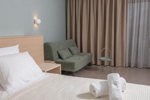 Un pat sau paturi într-o cameră la Samari Afitos