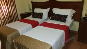 Postel nebo postele na pokoji v ubytování Hotel Chopin