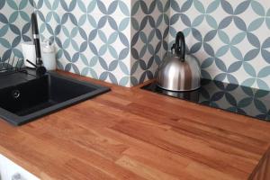 Kuchyňa alebo kuchynka v ubytovaní NADMORSKIE Chwile - Apartament