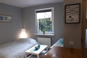 Posteľ alebo postele v izbe v ubytovaní NADMORSKIE Chwile - Apartament