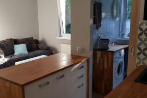 Kuchyňa alebo kuchynka v ubytovaní NADMORSKIE Chwile - Apartament