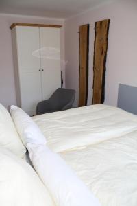 Postel nebo postele na pokoji v ubytování harz-traum.2