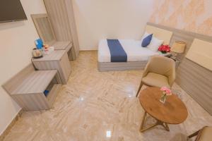 Posezení v ubytování Khanh Uyen 1 Hotel