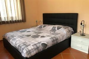 Кровать или кровати в номере La casa di Olivia