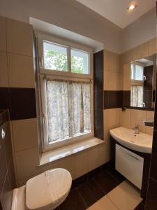 Kúpeľňa v ubytovaní CIENISTA 7 APARTMENTS