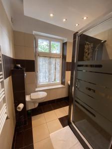 Kúpeľňa v ubytovaní CIENISTA 7 APARTMENTS