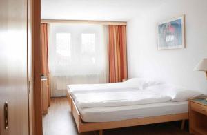 Postel nebo postele na pokoji v ubytování Saaserhof Apartments