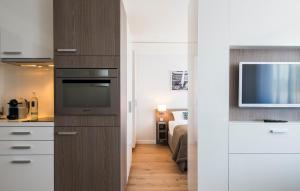 A cozinha ou cozinha compacta de Brera Serviced Apartments Frankfurt Oper