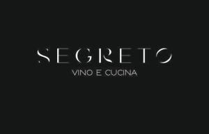a sign that reads segerico andvice e quinoa at Porto Galini Seaside Resort & Spa in Nikiana