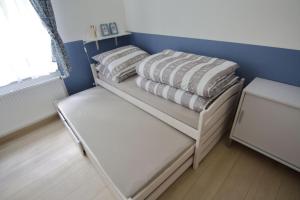Postel nebo postele na pokoji v ubytování Vila ELIS