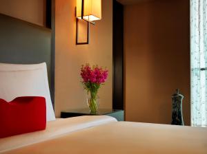 Postel nebo postele na pokoji v ubytování Himalayas Hotel Shanghai