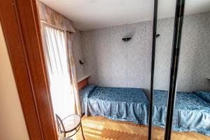 Tempat tidur dalam kamar di Hotel Pian Nava