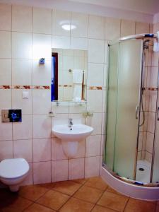 Kúpeľňa v ubytovaní Hotel Zamek Królewski w Rydzynie