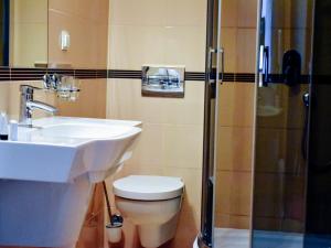 Kúpeľňa v ubytovaní Hotel Zamek Królewski w Rydzynie