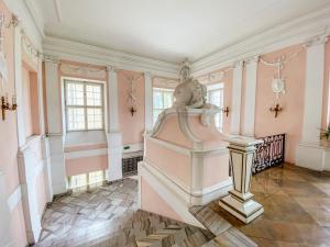 Posteľ alebo postele v izbe v ubytovaní Hotel Zamek Królewski w Rydzynie