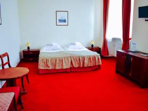 Posteľ alebo postele v izbe v ubytovaní Hotel Zamek Królewski w Rydzynie
