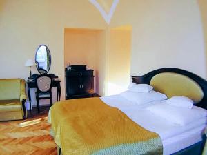 Posteľ alebo postele v izbe v ubytovaní Hotel Zamek Królewski w Rydzynie