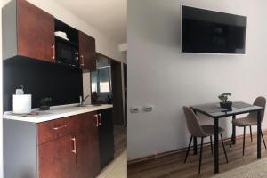 Kuchyňa alebo kuchynka v ubytovaní Apartments Ivan