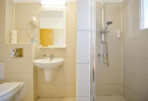 Koupelna v ubytování Hotel Decebal Bistrita