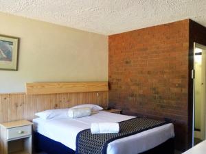 Postel nebo postele na pokoji v ubytování Motel Sierra - Bright