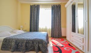 Postel nebo postele na pokoji v ubytování Hotel Decebal Bistrita