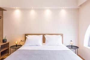 Posteľ alebo postele v izbe v ubytovaní Urban Lofts