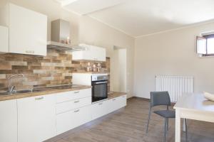 Kuchyňa alebo kuchynka v ubytovaní Residenza Cappelli - Case Vacanze
