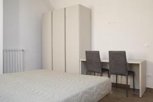 Posteľ alebo postele v izbe v ubytovaní Residenza Cappelli - Case Vacanze