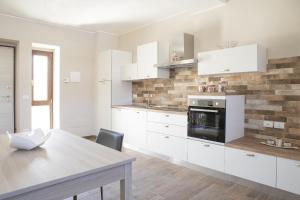 Kuchyňa alebo kuchynka v ubytovaní Residenza Cappelli - Case Vacanze