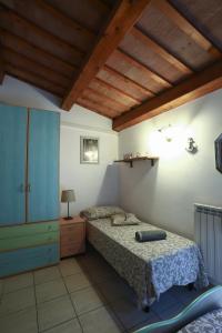 Llit o llits en una habitació de A Casa di Claudia