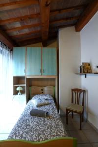 En eller flere senger på et rom på A Casa di Claudia