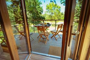 Balkon lub taras w obiekcie Apartamenty wśród drzew River Park
