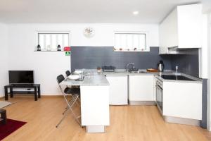 A cozinha ou kitchenette de Dom Pipas Houses - Batista & Marcelino Lda