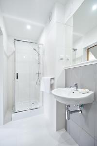 Kúpeľňa v ubytovaní Apartamenty Klasztorna 25