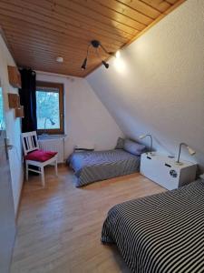 Postel nebo postele na pokoji v ubytování Haus am See Altjuehrden