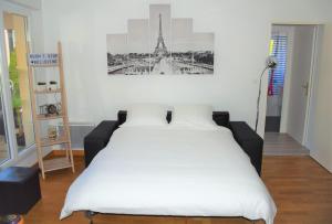 Kama o mga kama sa kuwarto sa Dream Appartement Paris