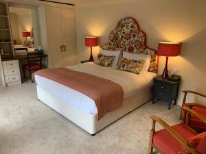 Ein Bett oder Betten in einem Zimmer der Unterkunft Caley Hall