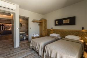 Кровать или кровати в номере Villa Achilleas