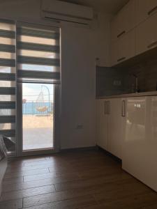 Kuchyň nebo kuchyňský kout v ubytování Apartments Boss