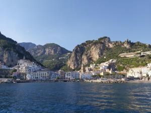 a view of positano on the amalfi coast at Casa Marea in Conca dei Marini