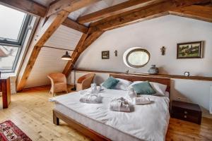 Postelja oz. postelje v sobi nastanitve Apartmány Šupina
