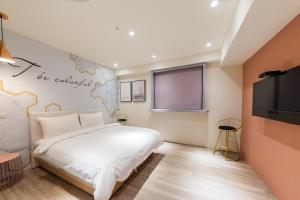 TV a/nebo společenská místnost v ubytování Talent Hotel + 37 fotografií